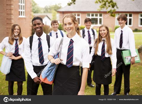 Portrait Teenage Students Uniform School Buildings Stock Photo by ©monkeybusiness 183061104