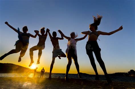 Young People Jumping on the Beach Stock Photo - Image of asian ...