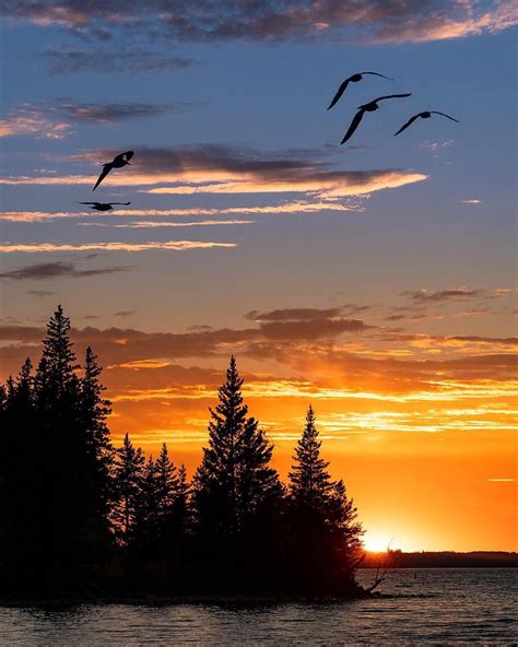 Sunset over Clear Lake in Riding Mountain National Park. One of the most beautiful places in all ...