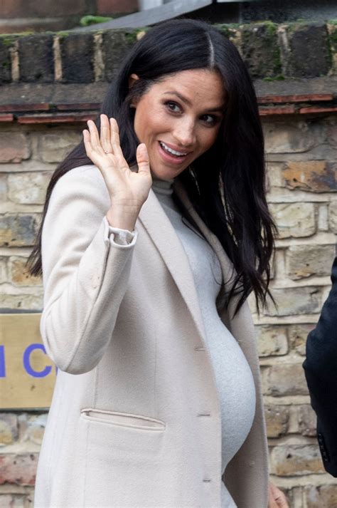 Pregnant MEGHAN MARKLE at Mayhew Animal Welfare Charity in London 01/16 ...