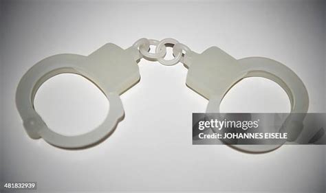 504 Chinese Handcuffs Stock Photos, High-Res Pictures, and Images ...