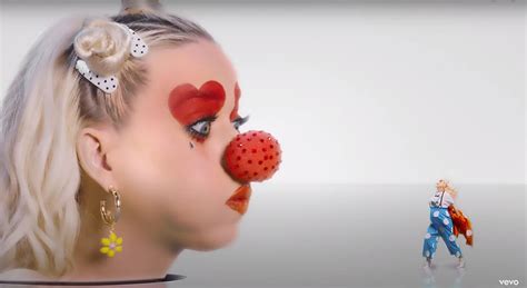 Pregnant Katy Perry Gets Her 'Smile' Back in Clown-Filled New Video