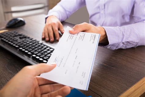 How to Sign a Check Over to Someone Else? | Checkissuing