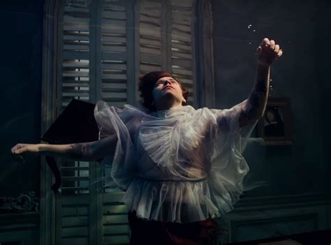 Harry Styles drowns in sheer tulle in the music video for "Falling"