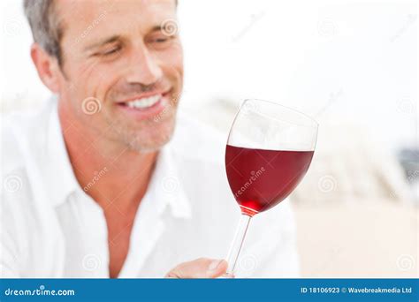 Handsome Man Drinking Some Red Wine Stock Photos - Image: 18106923