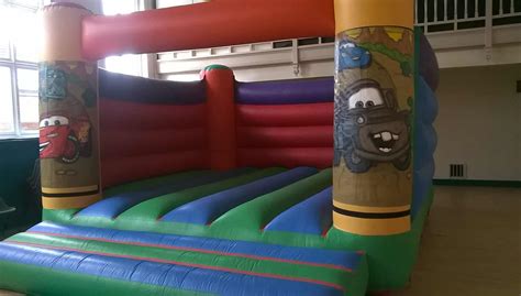 Multi-Coloured 18 X 18 Indoor Adult Bouncy Castle - Anstey Bouncy Castle Hire Leicester