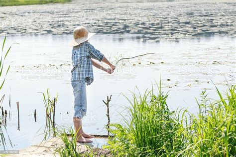 Full Length Boys Portrait Is Throwing Bait Of Fishing Rod Stock Photo - Download Image Now - iStock