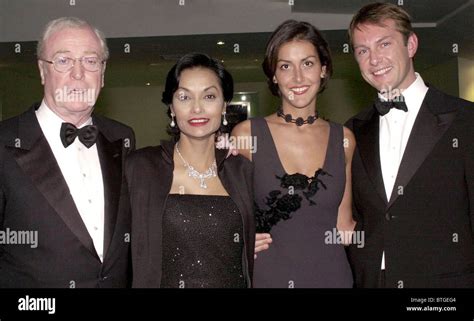 SIR MICHAEL CAINE, WIFE SHAKIRA, DAUGHTER NATASHA AND HUSBAND AT Stock Photo: 32324772 - Alamy