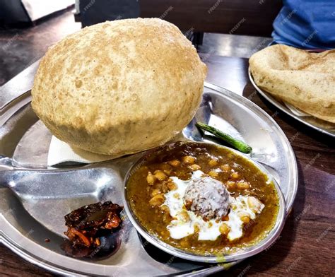 Premium Photo | Indian street food called chole bhature at restaurant in delhi