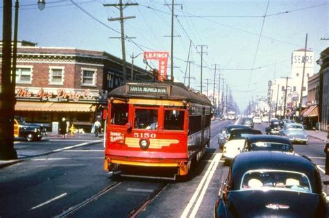 A Pacific Electric Red Car heads east along Santa Monica Boulevard in Los Angeles, early 1950s ...