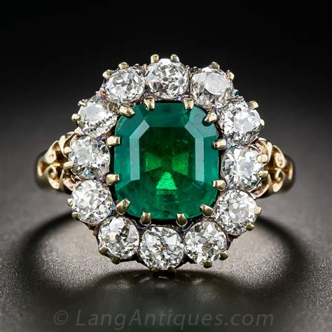 Vintage 2.75 Carat Emerald and Diamond Halo Ring