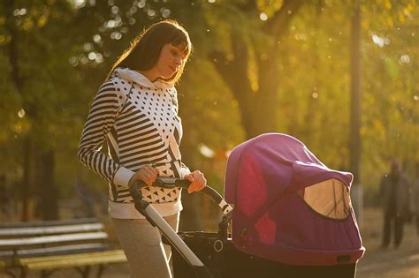 woman, holding, pink, black, stroller, baby stroller, child, girl | Piqsels