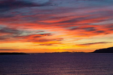 The sunset in Reykjavík, Iceland tonight was something else. : r/pics