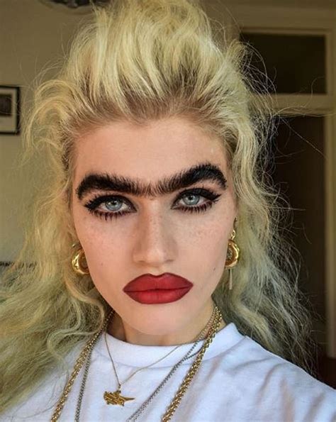 Model with jet-black monobrow admits she receives death threats online for her bushy facial hair ...