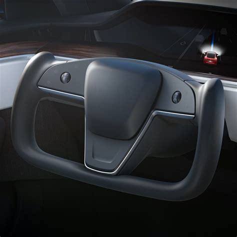 Tesla unveils new Model S with new interior, crazy steering wheel, and ...