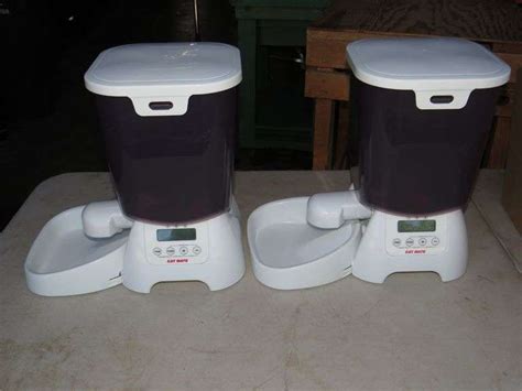 Two new battery-operated Cat Mate C3000 automatic pet feeders - AAA Auction and Realty