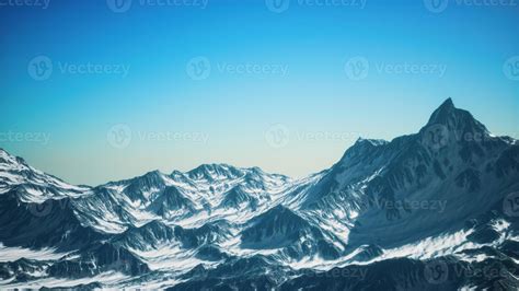 Aerial view of the Alps mountains in snow 5755047 Stock Photo at Vecteezy