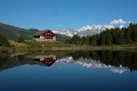 House And Mountain Lake Landscape Stock Photos - Image: 16488493