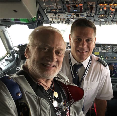 Buzz Aldrin was a passenger on my dad’s flight a few days ago. : r/pics