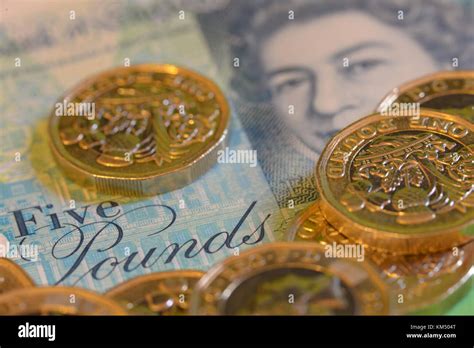 United Kingdom sterling currency notes and coins Stock Photo - Alamy