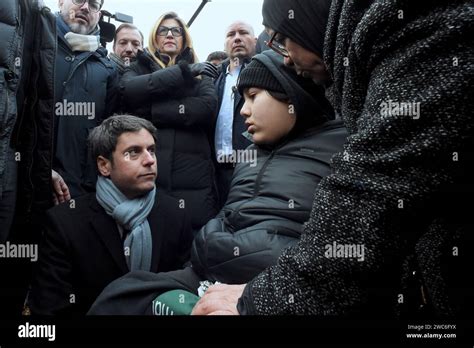 French Prime Minister Gabriel Attal meets with members of the public at the Caen market during a ...