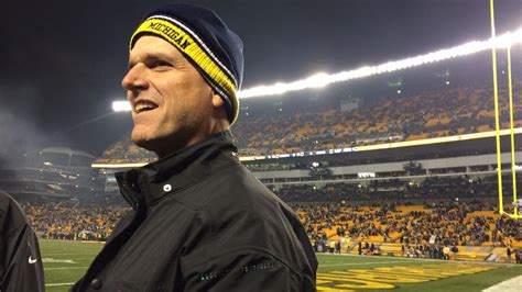 Michigan coach Jim Harbaugh attending Ravens-Steelers playoff game ...