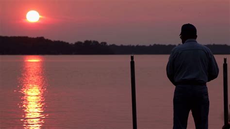 Man Fishing At Sunset Stock Footage SBV-300203802 - Storyblocks