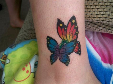 Butterfly kisses | Maple leaf tattoo, Tattoos, Tattoo artists