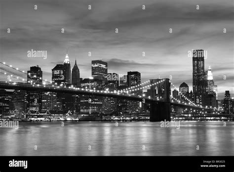 New York City Skyline and Brooklyn Bridge At Night Stock Photo - Alamy