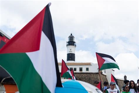 Premium Photo | Protesters are seen holding the palestinian flag during ...