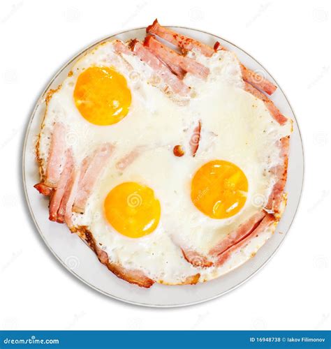 Fried eggs with bacon stock photo. Image of food, white - 16948738