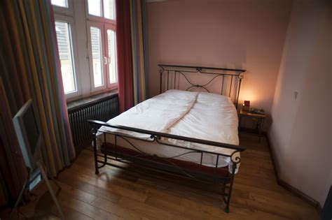 Free Stock Photo 8942 Minimalist bedroom with a hardwood floor | freeimageslive