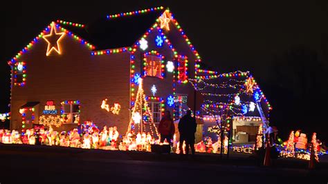 Ohio home covered in Christmas lights complete with illuminated archway