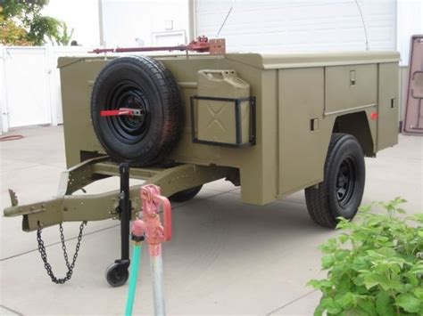 Great use of a truck service body converted into an off road trailer ...