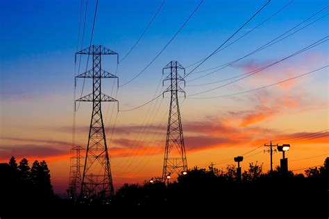 44711005 – beautiful silhouette of electricity towers during sunset. – AskDrPower.com