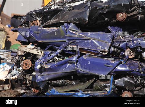 scrap metal cars on scrap yard Stock Photo - Alamy