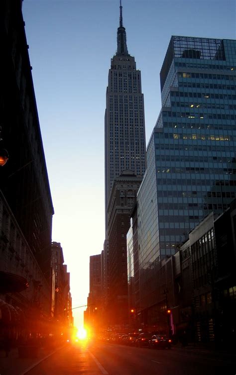 Manhattanhenge sunrise | New york buildings, New york city travel ...