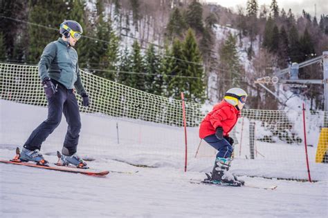 Boy Learning To Ski, Training and Listening To His Ski Instructor on ...