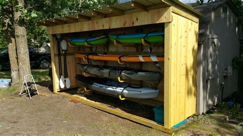 Kayak and paddle board shed #kayakshed | Kayak storage rack, Diy kayak storage, Kayak storage