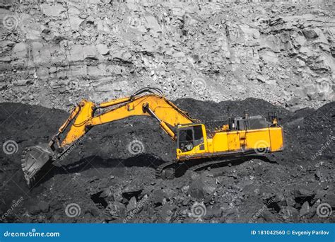 Open Pit Mine Industry Work of Large Yellow Excavator for Loading and ...