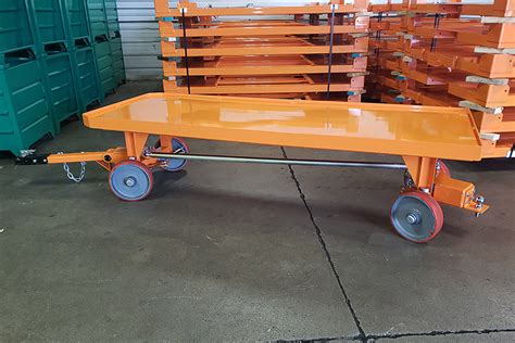 Heavy-Duty Quad Steer Tow Carts | Tugger Carts - Warehouse Rack and Shelf