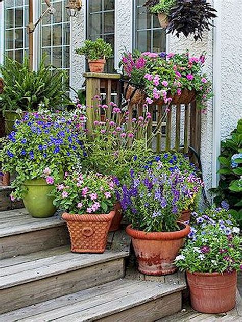 Pin by Lou Reyes on English cottage exterior | Container garden design, Garden containers