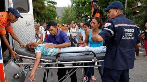 Families tear-gassed as 68 prisoners die in fire at jail in Venezuela ...