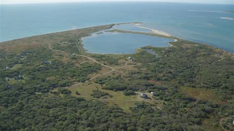 Approaching North Pond, Tuckernuck Island, Nantucket, Massachusetts Aerial Stock Footage AX144_119