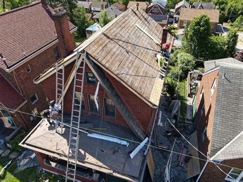 Wind damage repair by M&Y Pittsburgh Roofing