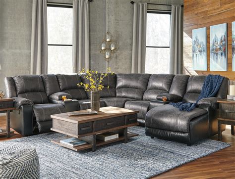 Signature Design by Ashley Nantahala Faux Leather Reclining Sectional with 2 Consoles & Chaise ...