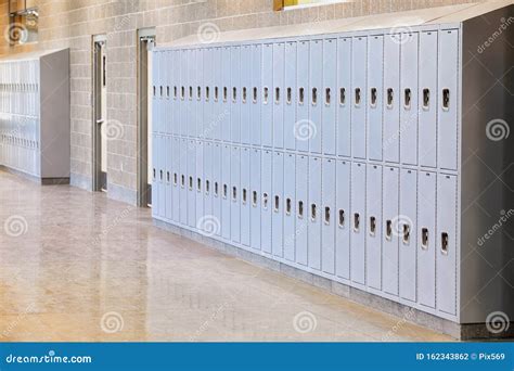 A Row of Lockers in a High School. Stock Photo - Image of pattern ...