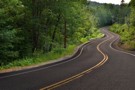 Curved Road In The Mountains Stock Photo - Image of drive, landscape ...