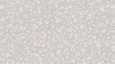 Premium AI Image | A Gray Floral Wallpaper With White Flowers