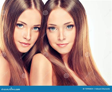 Double Portrait of Gorgeous Twins with Ong Shiny Healthy Hair.. Stock ...